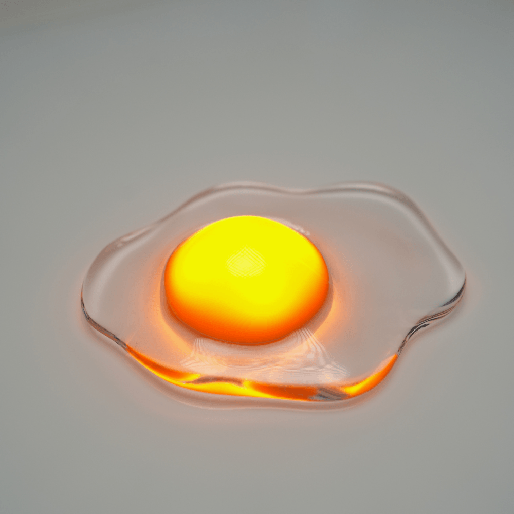 Fried egg night light glowing in a cozy room